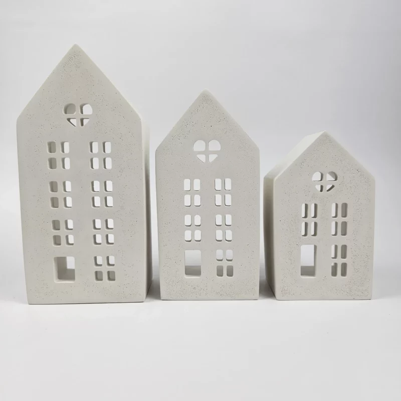 Ręcznie robione lampiony domki o porowatej strukturze w stylu minimalistycznym